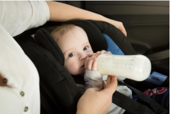 Feeding baby in car